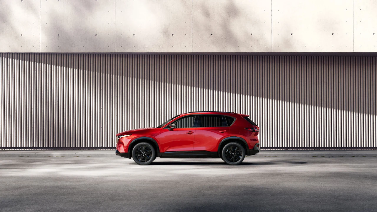 2026 Mazda CX-5 in Soul Red Crystal, showing the redesigned compact SUV profile