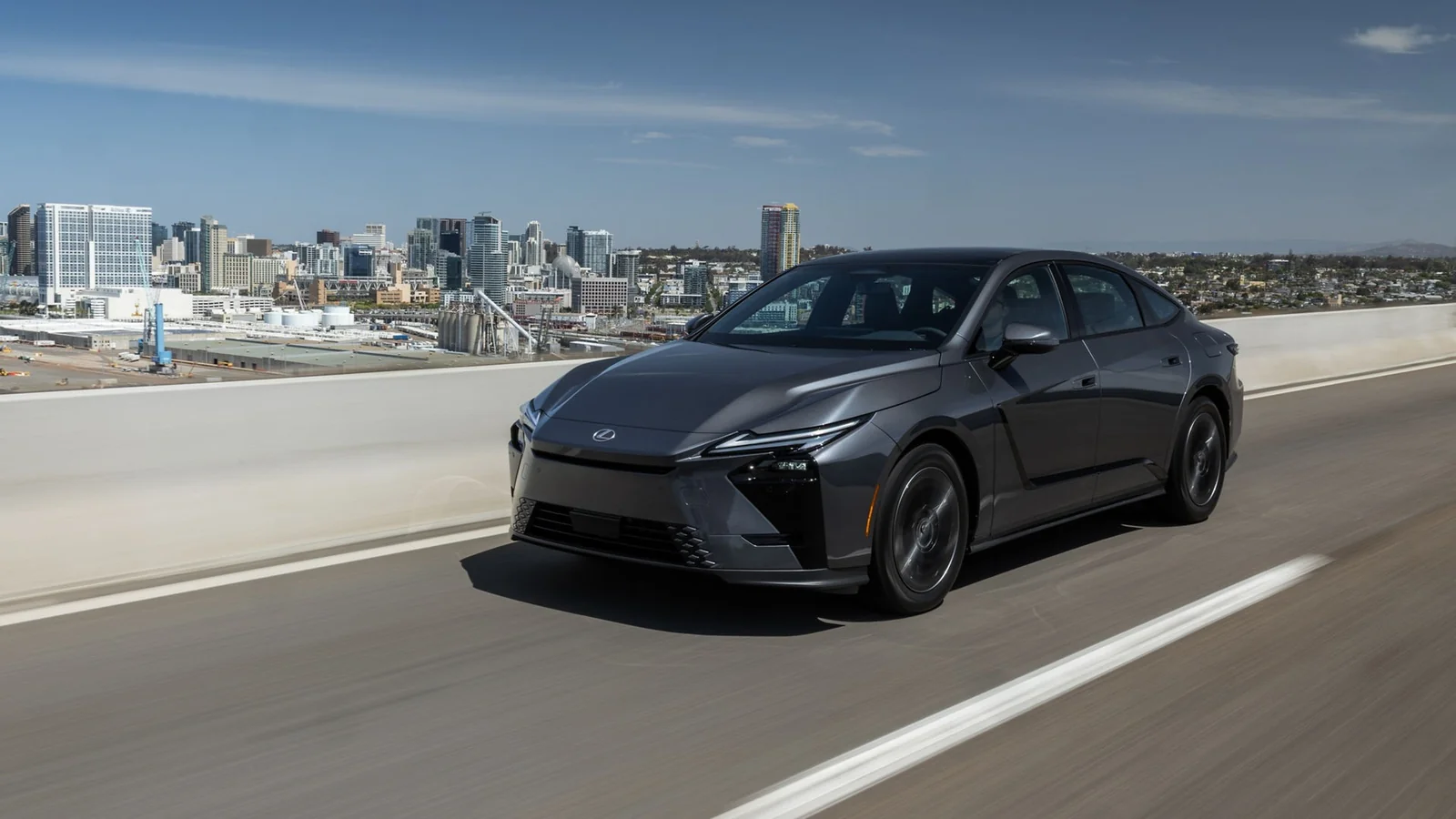 2027 Lexus ES 350h Premium in Cloudburst Gray, front three-quarter in a city setting