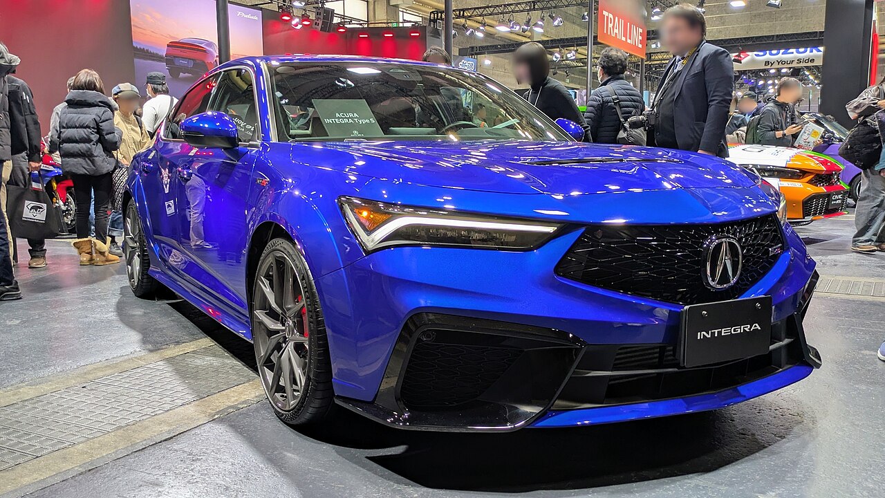 Acura Integra Type S DE5 race car, front three-quarter view, in World Blue at Osaka Auto Messe 2026