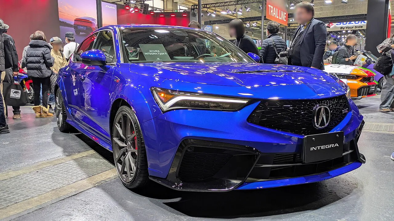 Acura Integra Type S DE5 race car, front three-quarter view, in World Blue at Osaka Auto Messe 2026