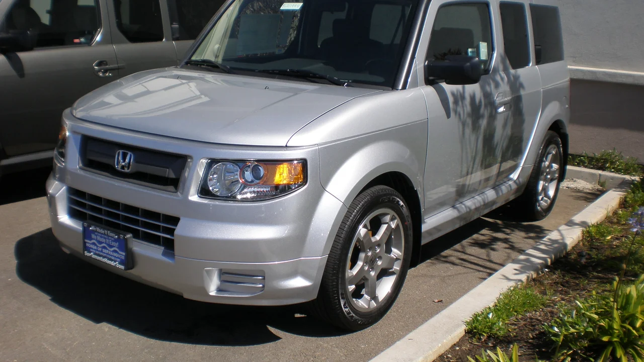 Original Honda Element in silver, front three-quarter view showing the boxy proportions and upright windshield