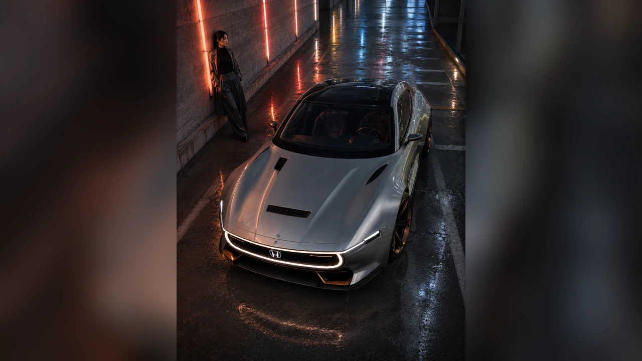 AI-generated next-generation Honda Prelude concept viewed from above in a rain-lit parking structure