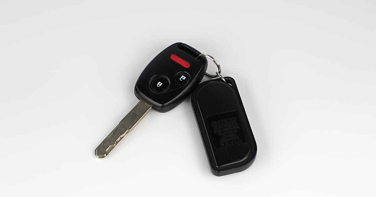 Handing over a Honda key fob &mdash; closing a fair deal in Vaughan