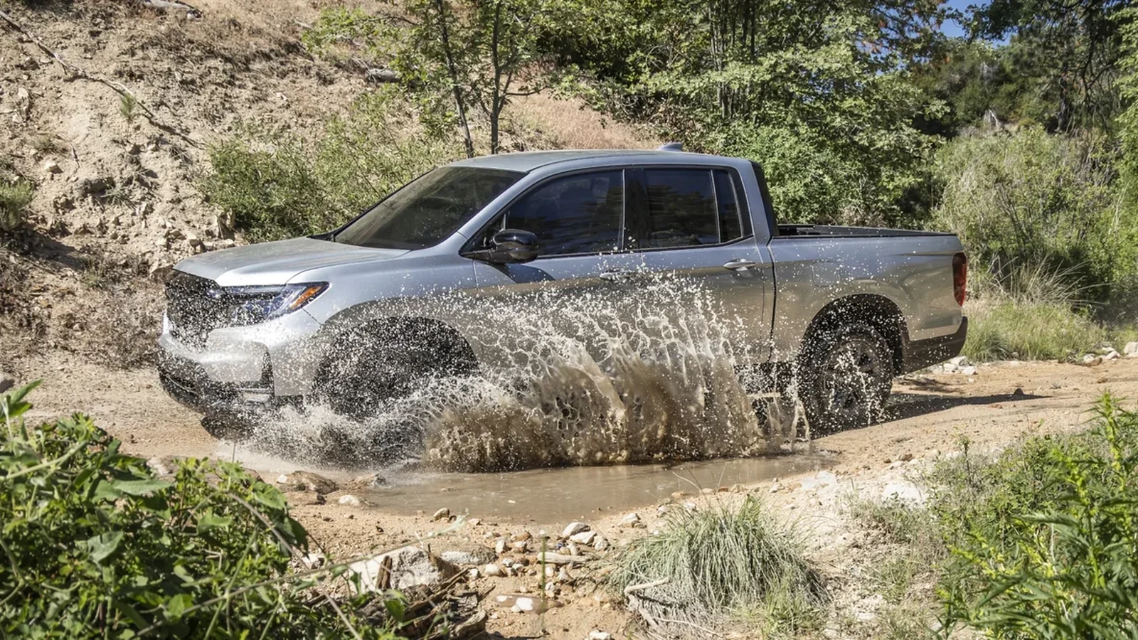 2026 Honda Ridgeline TrailSport in Sonic Grey with all-terrain tires