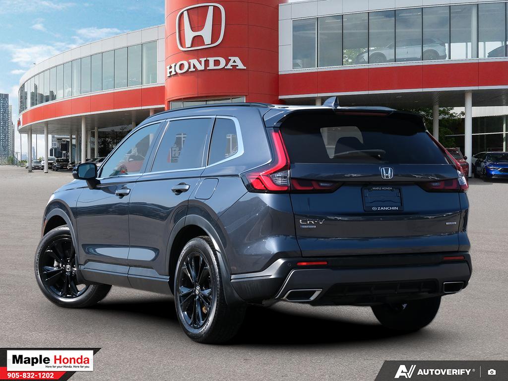 2024 Honda CR-V Hybrid Touring AWD — rear three-quarter view
