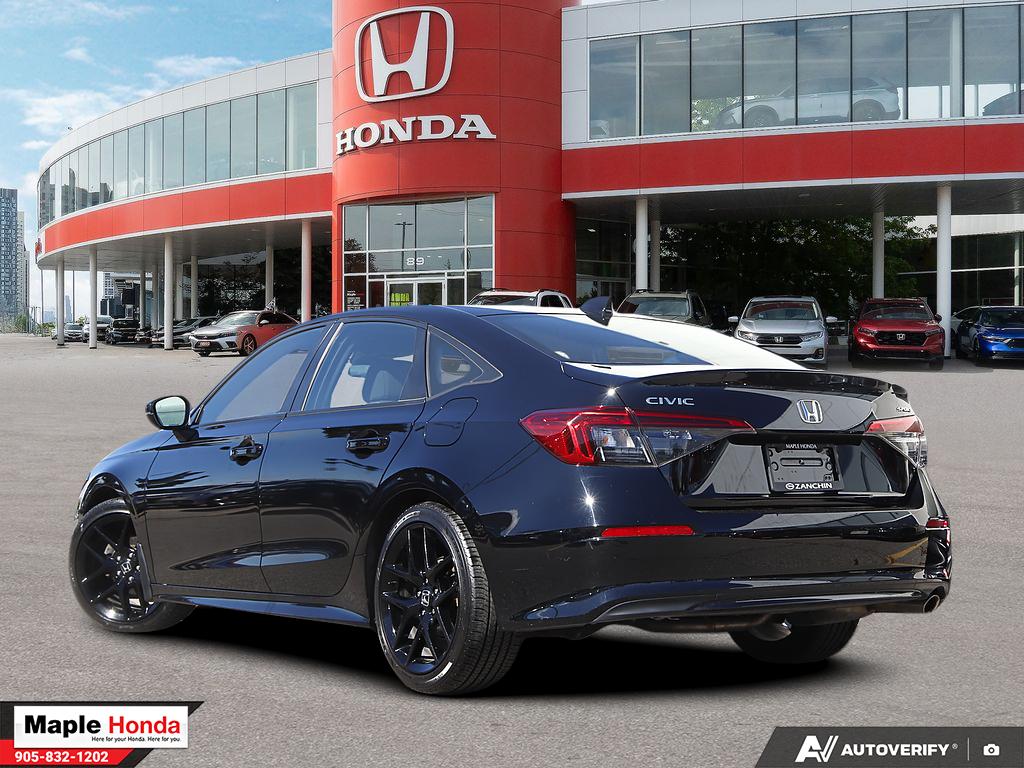 2023 Honda Civic Sport — rear three-quarter view