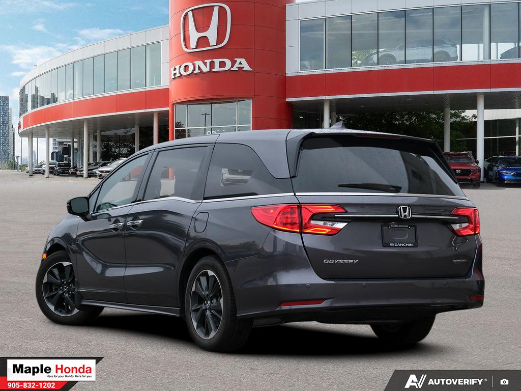 2023 Honda Odyssey Touring — rear three-quarter view