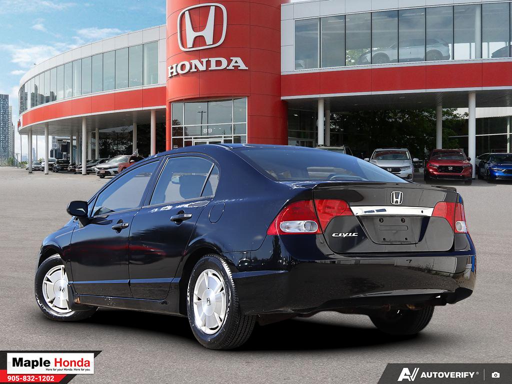 2009 Honda Civic DX-G — rear three-quarter view