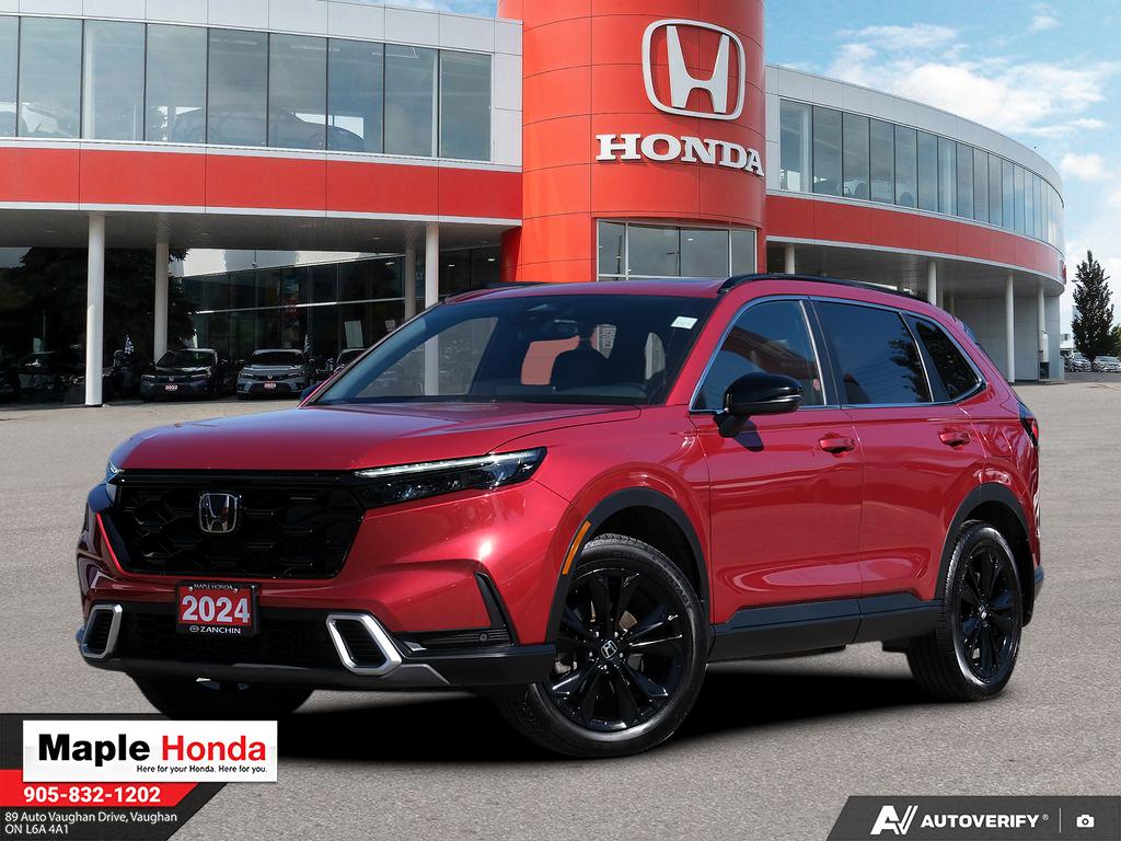 2024 Honda CR-V Hybrid Touring AWD in Red — front three-quarter view on the lot at Maple Honda in Vaughan