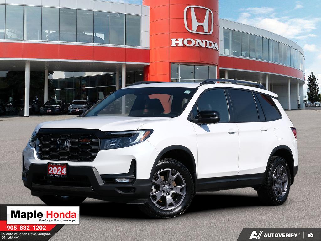 2024 Honda Passport TrailSport in White — front three-quarter view on the lot at Maple Honda in Vaughan
