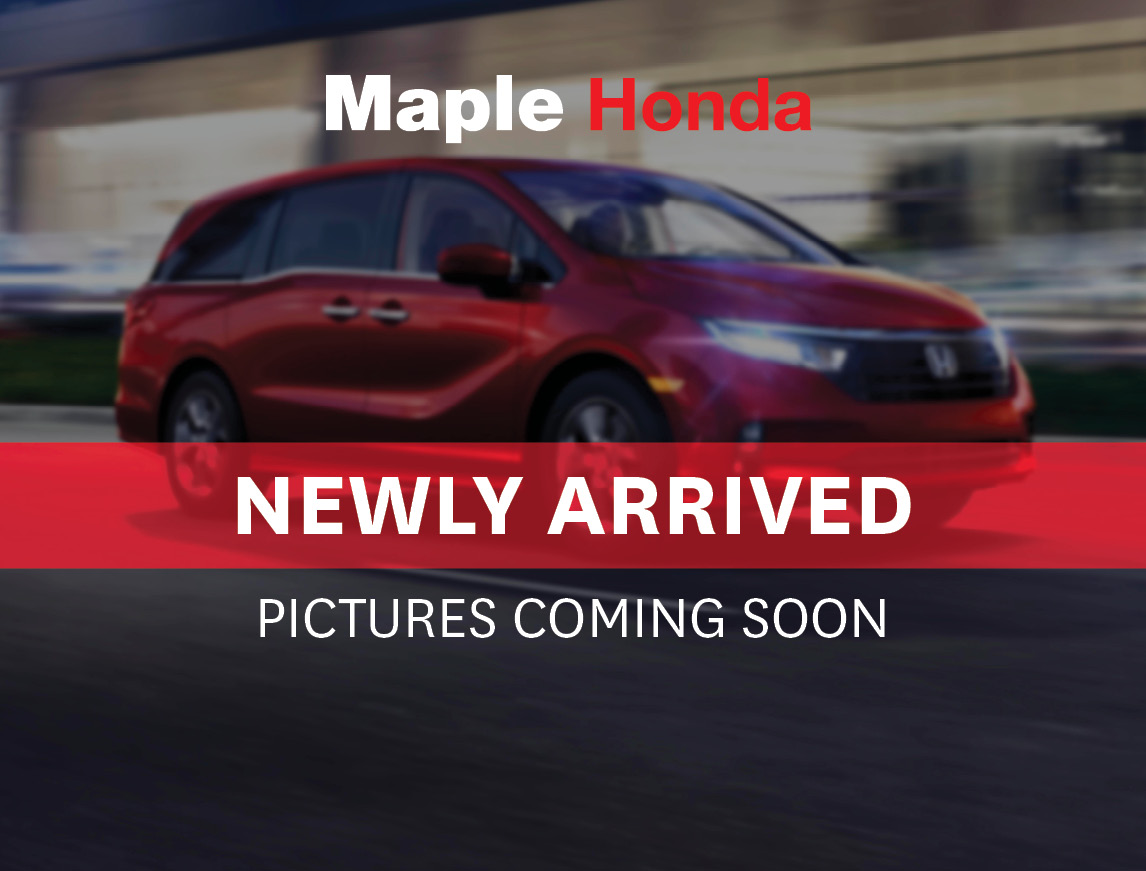 2016 Honda Odyssey EX in Grey — front three-quarter view on the lot at Maple Honda