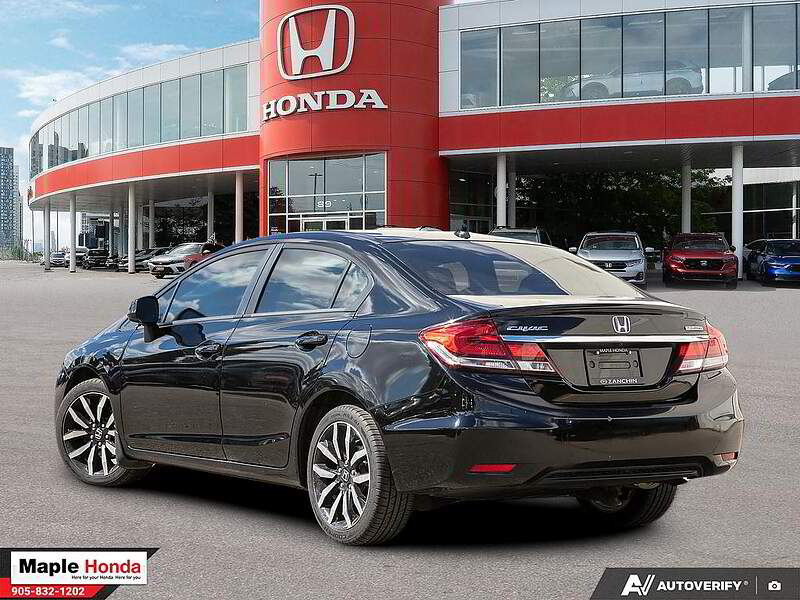 2013 Honda Civic Touring — rear three-quarter view
