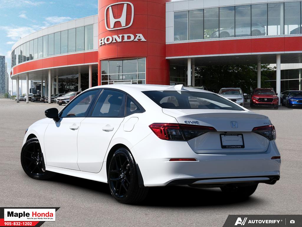 2024 Honda Civic Sport — rear three-quarter view