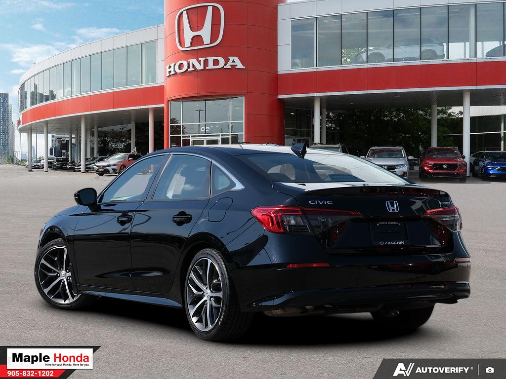 2023 Honda Civic Touring — rear three-quarter view
