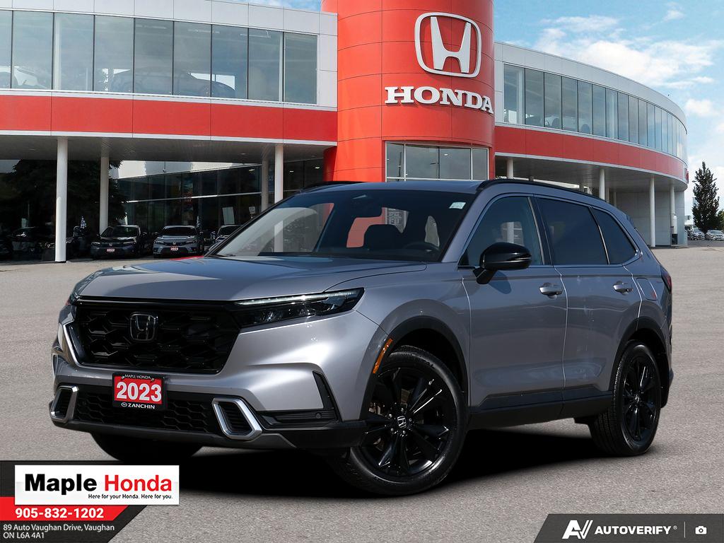 2023 Honda CR-V Hybrid Touring AWD in Silver — front three-quarter view on the lot at Maple Honda in Vaughan