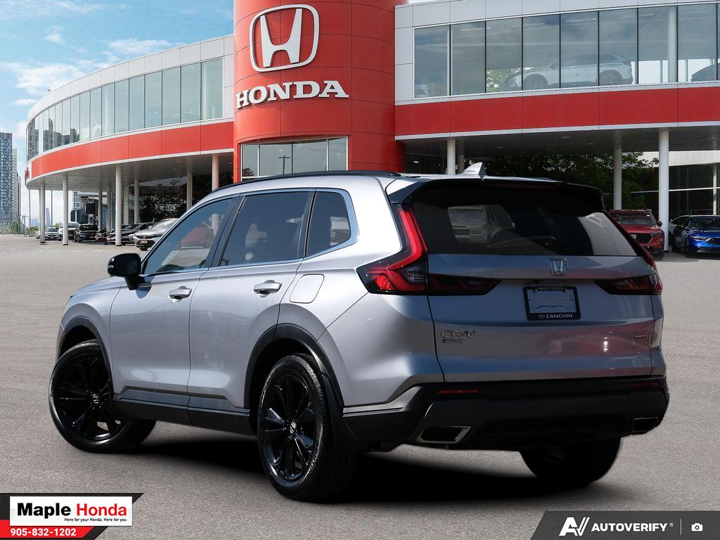 2023 Honda CR-V Hybrid Touring AWD — rear three-quarter view