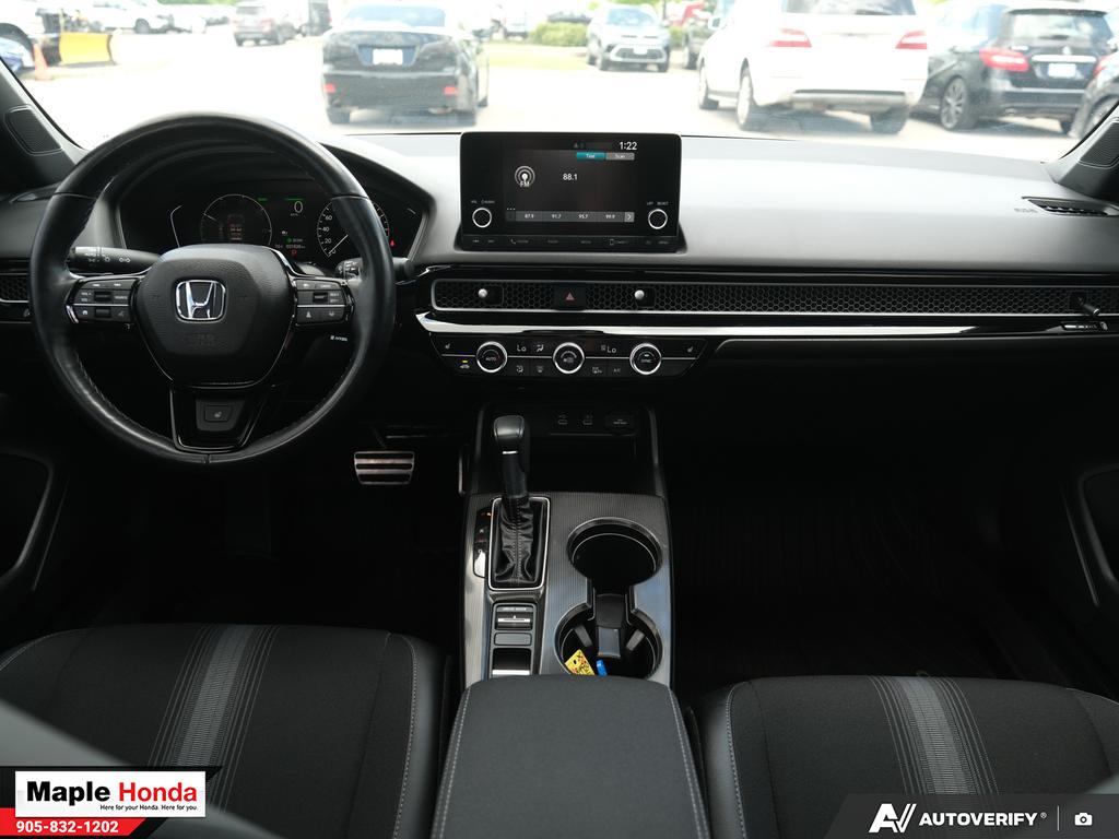 Cabin and dashboard wide view from the rear seat