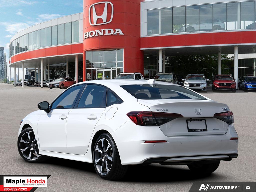 2025 Honda Civic Sport Touring Hybrid — rear three-quarter view