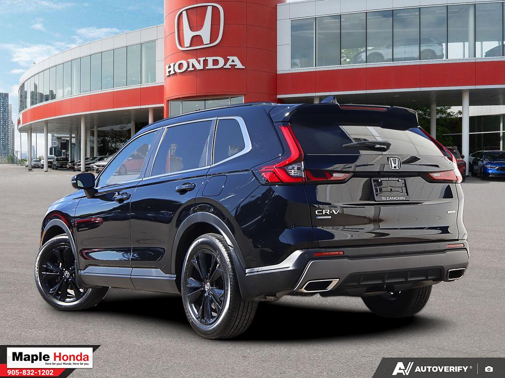 2024 Honda CR-V Hybrid Touring AWD — rear three-quarter view