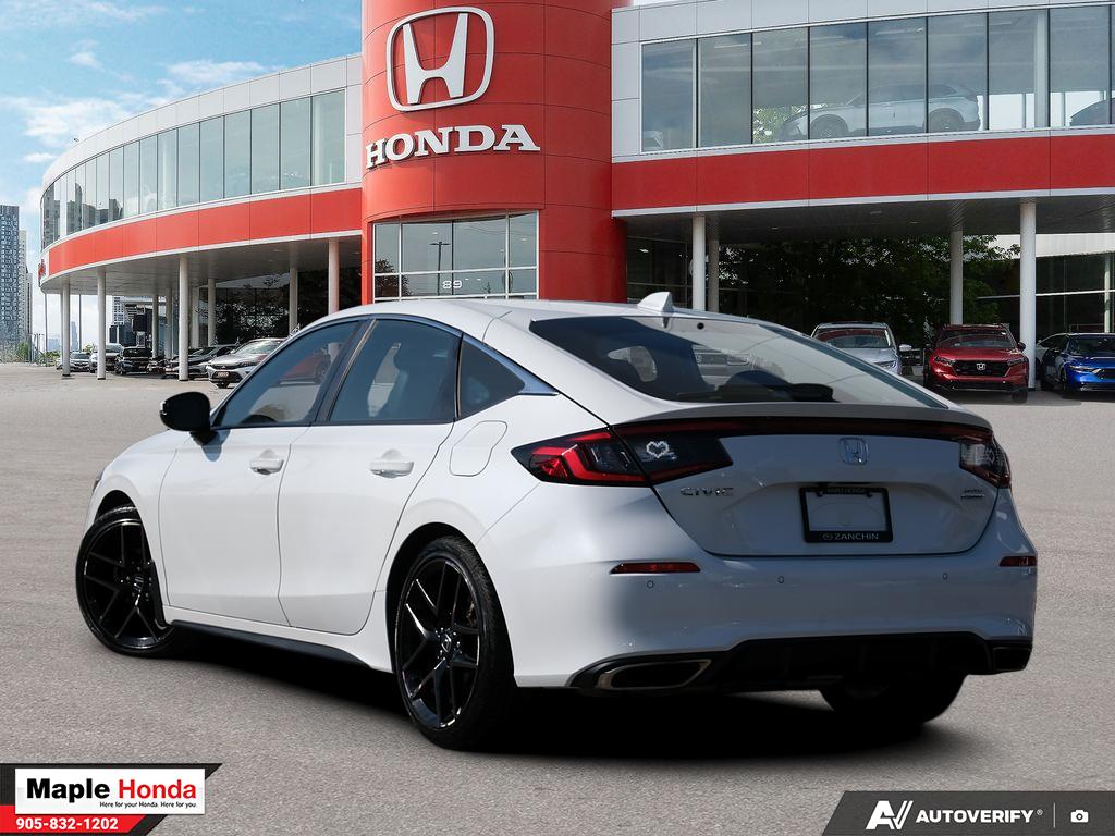 2023 Honda Civic Hatchback Sport Touring — rear three-quarter view
